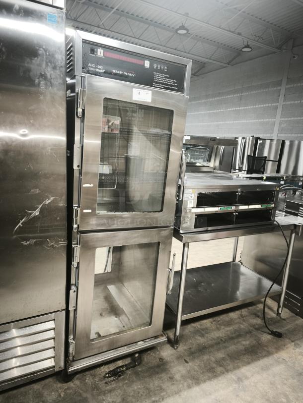 BRAND NEW Henny Penny AHC-990 Smart Hold Heated Holding Cabinet, 240v/1ph, stainless steel, on casters.