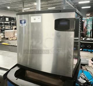 Manitowoc IYT0620A-161 Indigo NXT 22" ice machine, like new, 575 lb capacity, air-cooled, half dice, item tag visible.