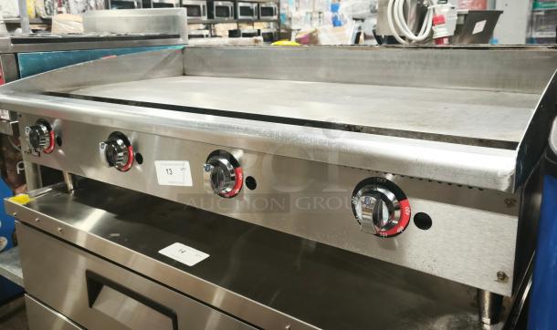 LIKE NEW Star Star-Max 648MF 48" gas countertop griddle with manual controls, 113,200 BTU, visible condition tag.