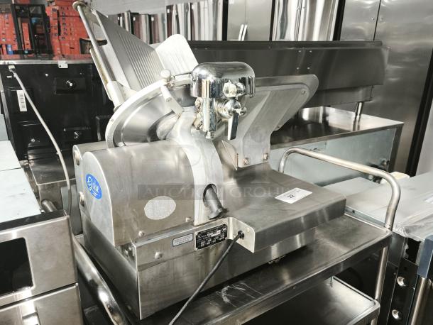 Brand new Globe 3875V 12" commercial meat slicer; stainless steel, powerful motor, precision slicing, blue Globe logo.