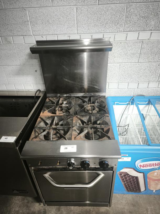 Tri-Star TSR-4 24" commercial gas range with 4 heavy-duty burners, storage base, chrome rack, tested, and working. 33,000 BTUs/burner.