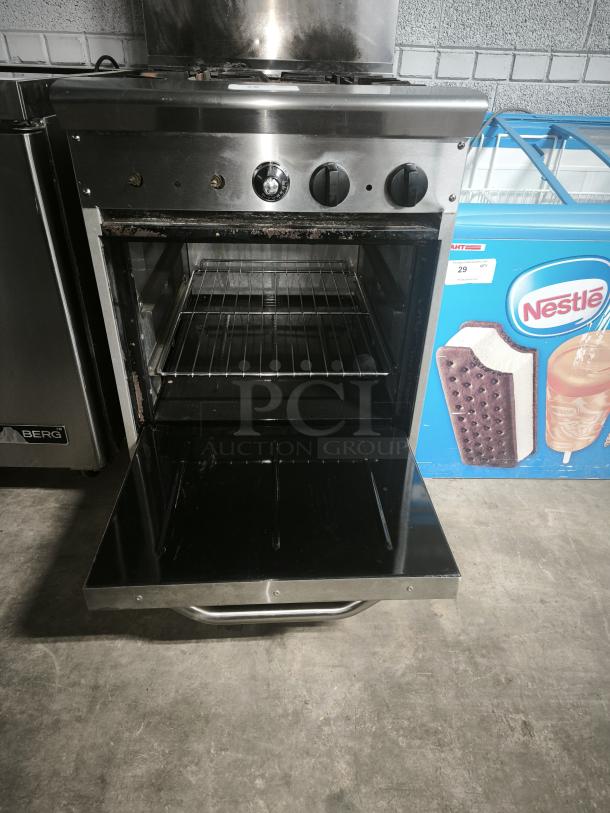 Tri-Star TSR-4 24" commercial gas range with 4 burners, chrome-plated rack, and storage base. Tested, 33,000 BTUs per burner.