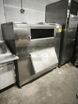 MGR Equipment SP-1650-SS ice storage bin, stainless steel, industrial grade, side door, visible signage, good condition.
