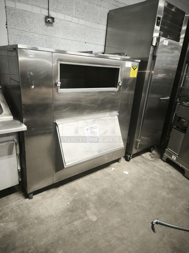 MGR Equipment SP-1650-SS ice storage bin, stainless steel, visible label for spills, good condition.