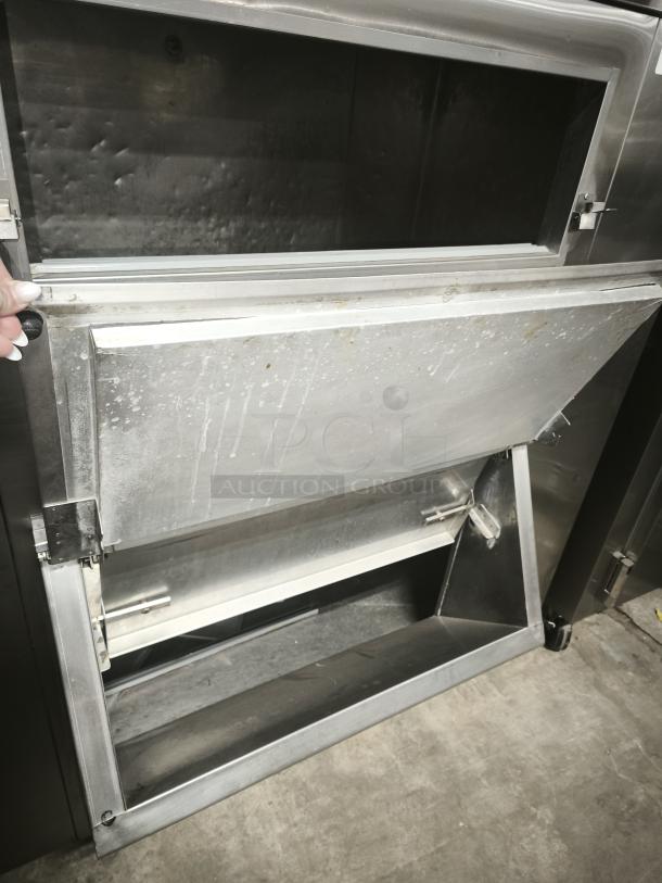 MGR Equipment SP-1650-SS ice storage bin, stainless steel, open lid, used condition, spacious interior, durable construction.