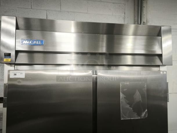 McCall 2-door solid reach-in freezer, Model 4-4045F, commercial-grade, stainless steel, good condition, visible brand logo.
