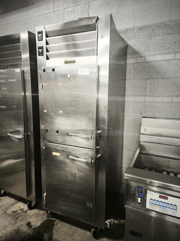 Traulsen RDT132WUT-HHS stainless steel reach-in refrigerator/freezer, 21.6 cu. ft., like new, tested, 115 volts.