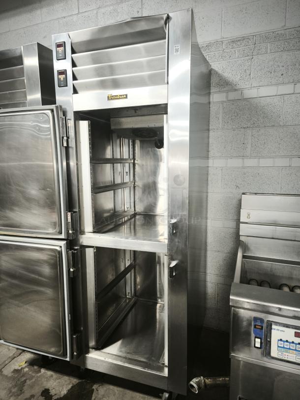 Traulsen RDT132WUT-HHS stainless steel reach-in refrigerator/freezer, like new, 21.6 cu. ft., 115 volts, specification line.