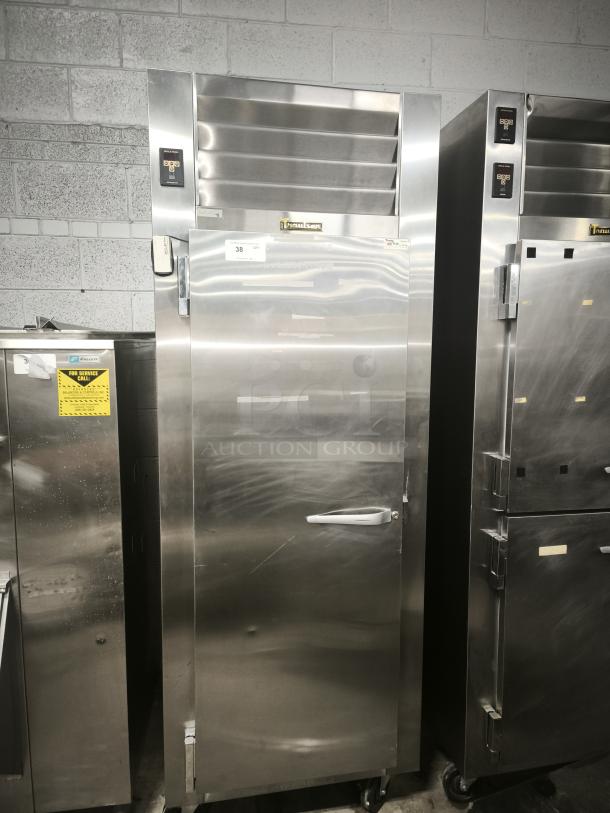 LIKE NEW Traulsen RHT132WUT-FHS stainless steel 24.2 Cu. Ft. reach-in refrigerator, one section, tested and working.