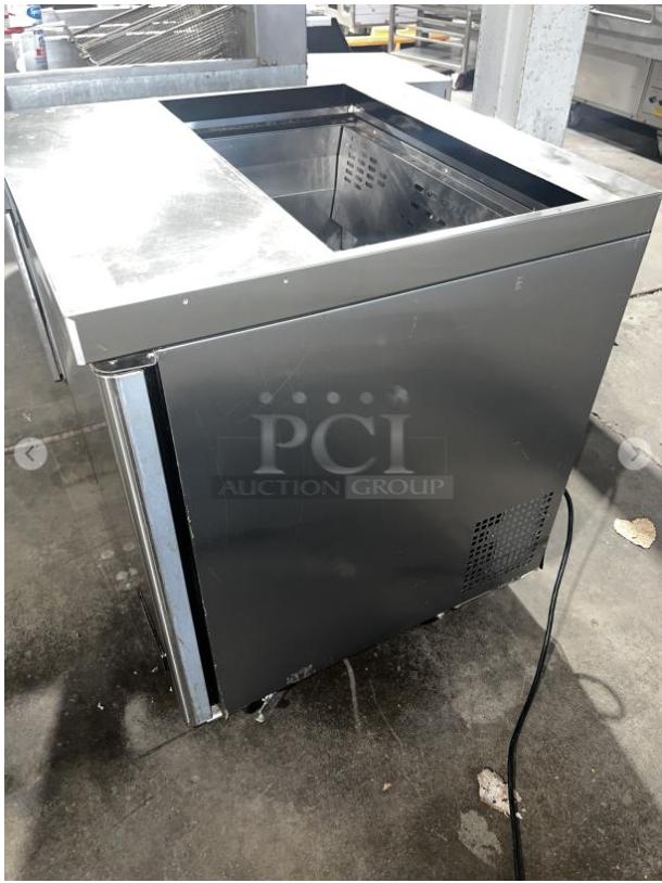 BERG BERS27 8 Pan 1-Door Sandwich Prep Table; stainless steel, durable condition, enhances kitchen efficiency.