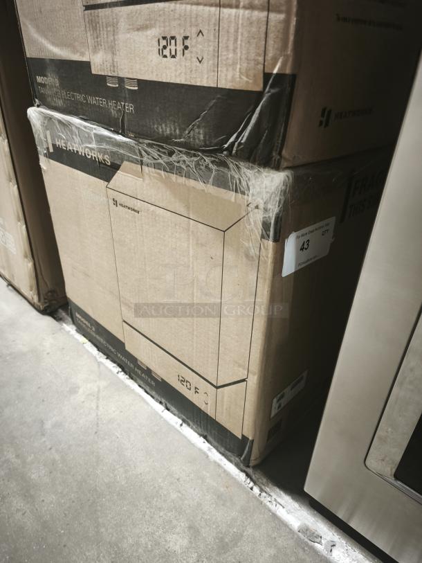Heatworks Model 3 tankless electric water heater in box, HW‑0007, new condition, 120°F indicator on packaging.