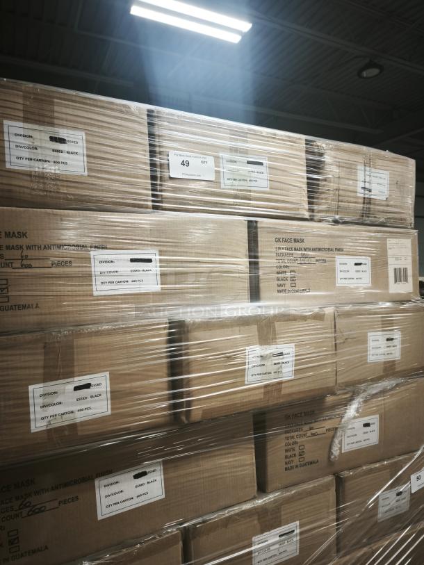 Bulk shipment of GK 3-ply face masks with antimicrobial finish, black, in sealed cartons. Labels indicate 600 pieces per carton.