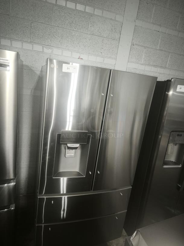 LG 27.8 cu ft 4-Door Smart French Door Refrigerator, model LRMXS2806S/05. Features Craft Ice™, new condition.
