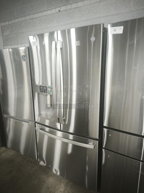 GE 27.7 Cu. Ft. French-Door Refrigerator, model GFE28GYNFS, fingerprint-resistant stainless steel, used condition.