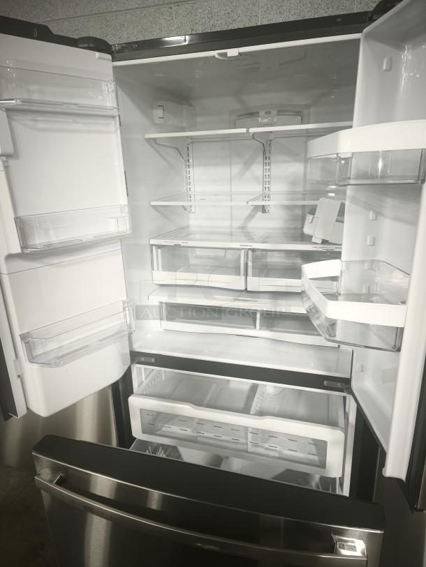 GE 27.7 Cu. Ft. French-Door Refrigerator, stainless steel, fingerprint-resistant. Model GFE28GYNFS, used, clean interior.
