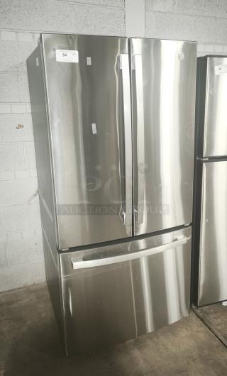 GE 27.7 Cu. Ft. stainless steel French-door refrigerator, fingerprint-resistant, used, in working condition.