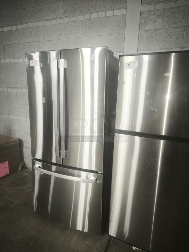 GE 27.7 Cu. Ft. stainless steel French-door refrigerator, fingerprint-resistant, used and working, model visible.