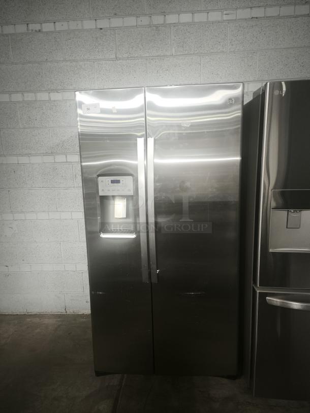 GE 25.1 cu. ft. fingerprint-resistant side-by-side refrigerator, model GSS25IYNFS, used, stainless steel.