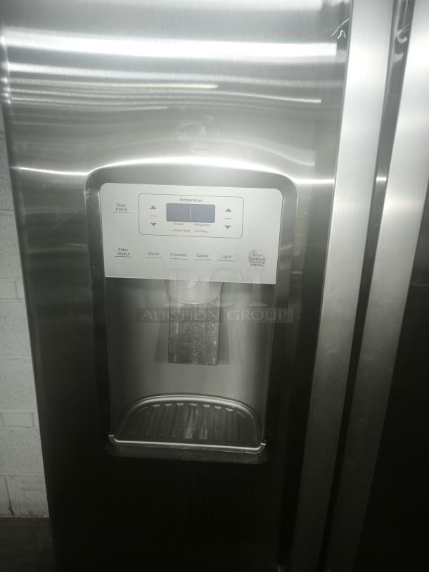 GE 25.1 cu. ft. fingerprint-resistant side-by-side refrigerator, model GSS25IYNFS, used condition, with water dispenser.