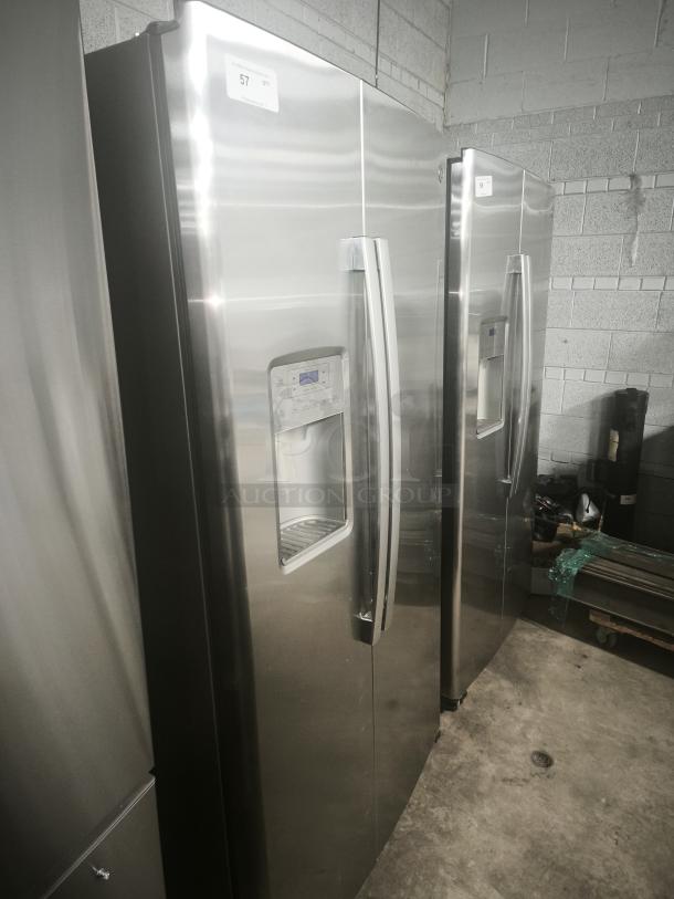 GE 25.1 cu. ft. side-by-side refrigerator, model GSS25IYNFS. Fingerprint-resistant, used but in working condition.