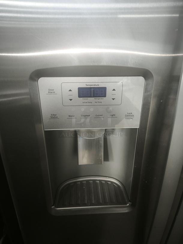 GE 25.1 cu. ft. fingerprint-resistant side-by-side refrigerator, model GSS25IYNFS, with digital controls, used condition.