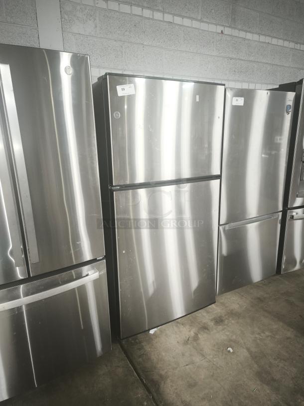 GE 21.1 cu. ft. top-freezer fridge, model GIE21GSHSS, stainless steel, used, working condition, Energy Star certified.