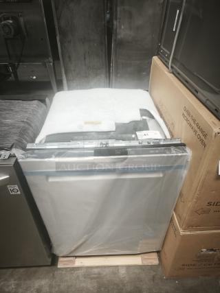 Brand new Whirlpool 24" top control dishwasher, model WDTA50SAKZ3, stainless steel, AI wash, 3rd rack, 47 dBA, in packaging.