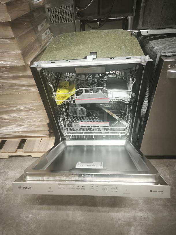 Brand new Bosch 500 Series 24" top control dishwasher in stainless steel, featuring a 3rd rack, AutoAir, 44 dBA.