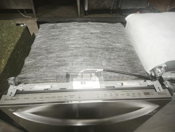 Brand new LG 24-Inch QuadWash® Top Control Smart Dishwasher, model LDTS5552S, showing control panel and labels.