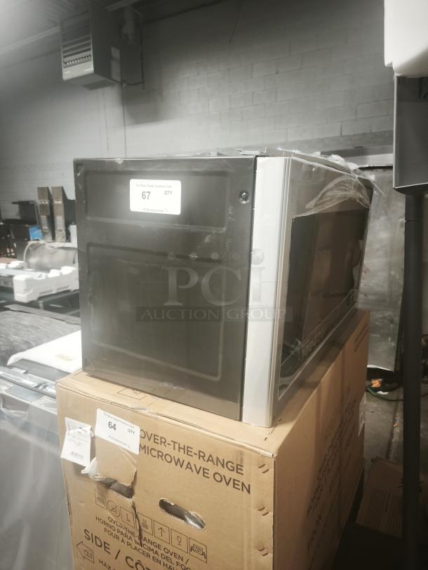 Brand new GE Profile 2.1 Cu. Ft. Over-the-Range Sensor Microwave Oven, Model PVM9005S8SS, in packaging.