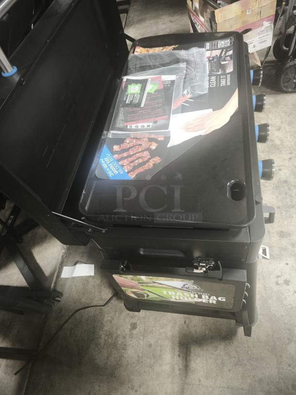 Pit Boss Ultimate 4-Burner Griddle, Model 10782, brand new. Features lift-off design, stainless steel body, included manuals.