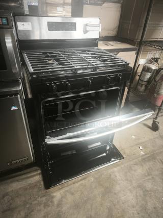 Whirlpool 30-in freestanding gas range (model WFG505M0MS0). Features 5 burners, edge-to-edge cooktop, open oven door. Excellent condition.