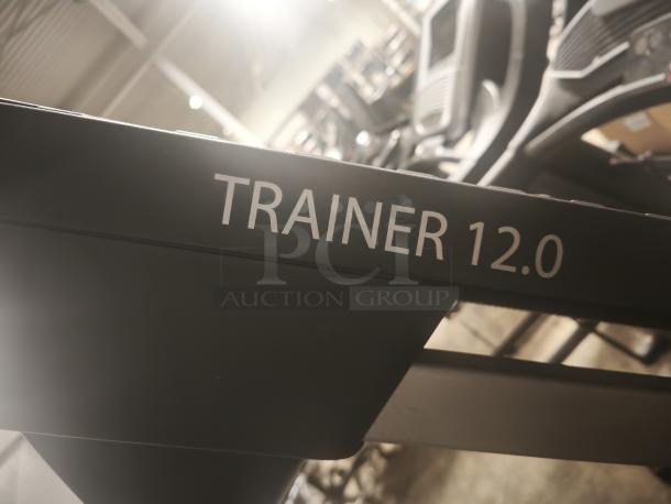 ProForm Trainer 12.0 treadmill, model pftl99721.0, features bold "TRAINER 12.0" text, in good condition.