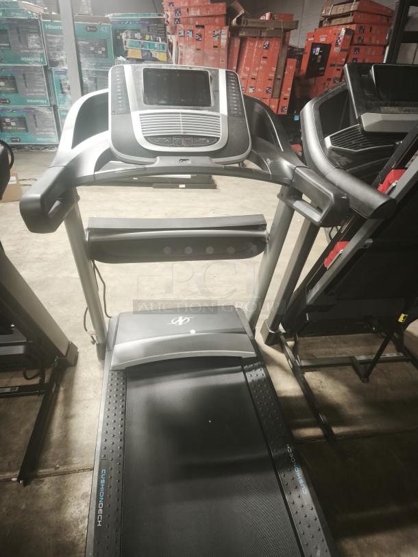 NordicTrack S45i treadmill, model NTL99520, in good condition. Features include console display and Cushion Deck technology.