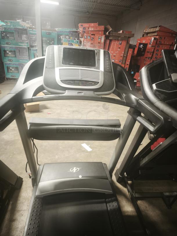 NordicTrack S45i treadmill, model NTL99520, featuring a digital console, tested and in working condition.