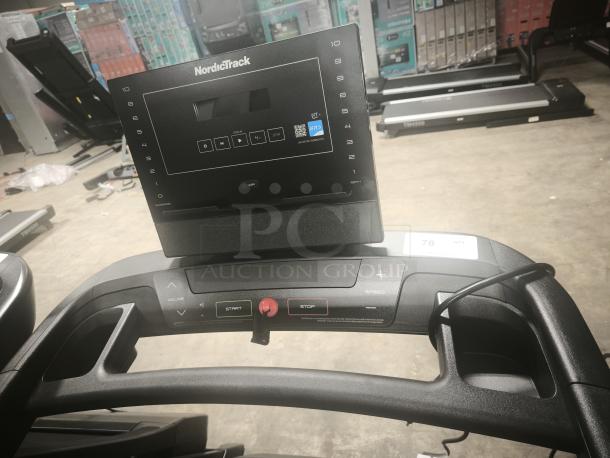NordicTrack T Series 7 Treadmill, model NTL10225, tested and working. Features incline controls, start/stop buttons.