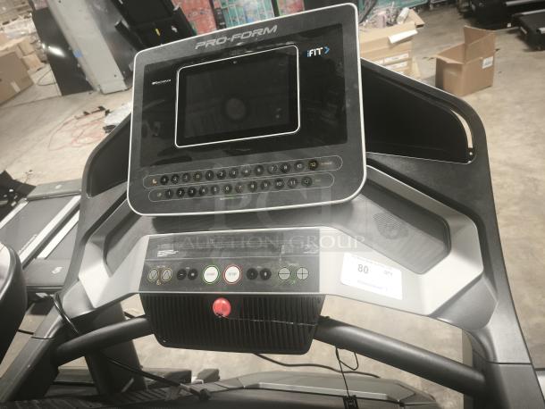 ProForm Pro 2000 treadmill PFTL12820, 10” HD touchscreen, tested and working, visible control panel and auction tag.