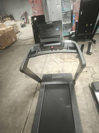 NordicTrack T Series 7 treadmill, model NTL10225, in working condition. Features control panel and sturdy frame.