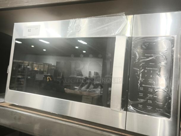 Brand new GE 1.9 Cu. Ft. over-the-range microwave, model JVM7195SK6SS. Stainless steel finish, control panel intact.