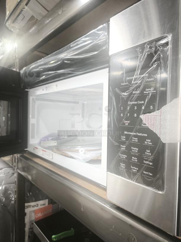BRAND NEW GE 1.9 Cu. Ft. Over-the-Range Microwave Oven, Model JVM7195SK6SS, with stainless steel finish and packaged controls.