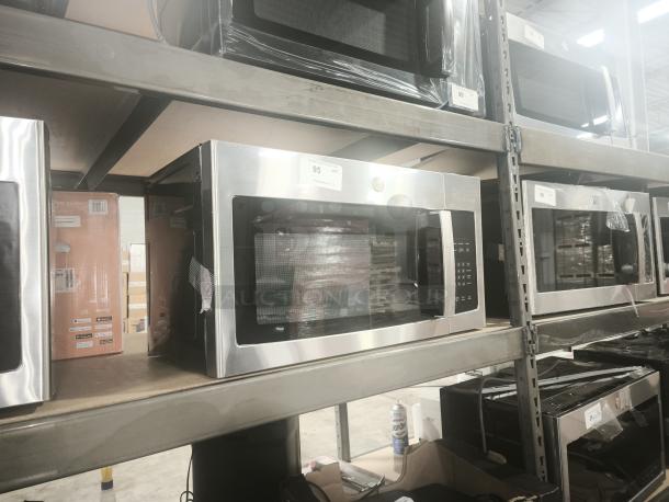 BRAND NEW GE 1.6 Cu. Ft. Over-the-Range Microwave, Model JNM3163RJ6SS, with recirculating venting, in warehouse.