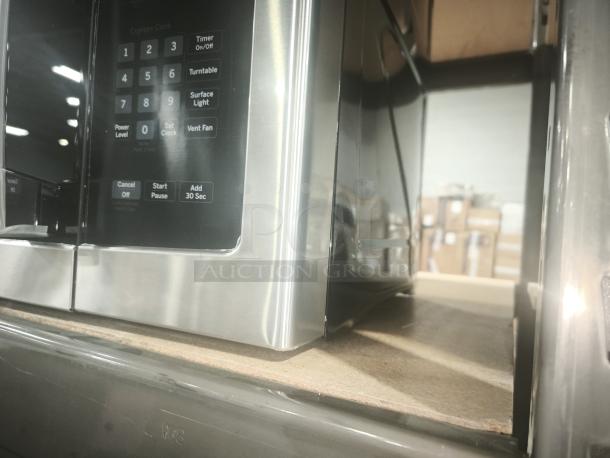 Brand new GE 1.6 Cu. Ft. Over-the-Range Microwave Oven, model JNM3163RJ6SS, with recirculating venting, shown in stainless steel finish.