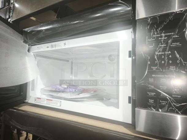 BRAND NEW GE 1.6 Cu. Ft. Over-the-Range Microwave, Model JNM3163RJ6SS, featuring recirculating venting, unused.