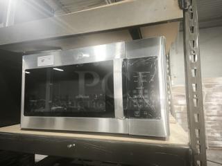 Brand new GE 1.6 cu. ft. over-the-range microwave, model JVM3160RF9SS, in stainless steel. Features keypad, digital display.