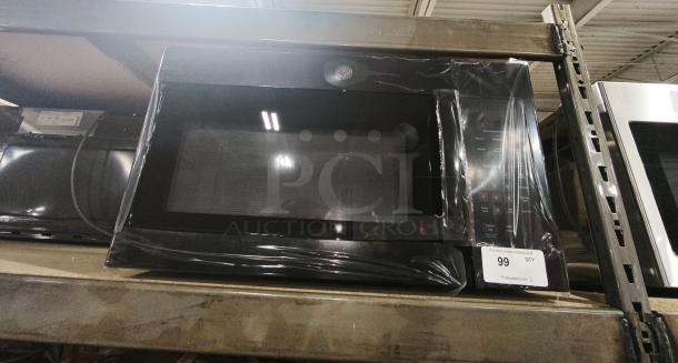 BRAND NEW GE 1.6 Cu. Ft. Over-the-Range Microwave, Model JVM3160DF9BB. Factory-sealed, auction label visible.