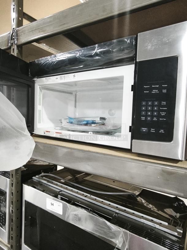 BRAND NEW GE 1.6 Cu. Ft. Over-the-Range Microwave Oven, Model JVM3162RJ6SS, stainless steel, touchpad controls, interior view.