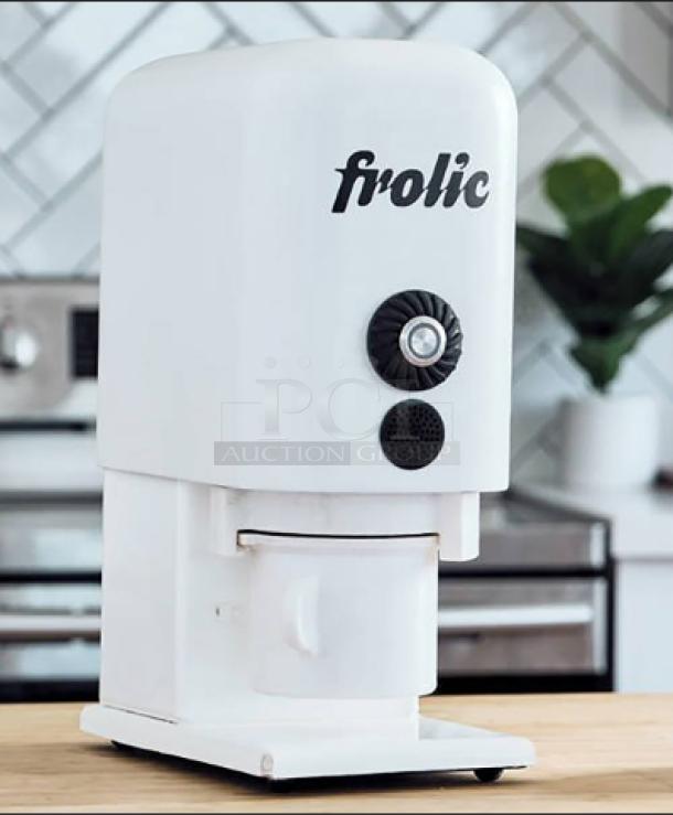 Brand new Frolic Ice Cream Maker, model Frolic Machine, in pristine condition. Sleek white design with logo branding.
