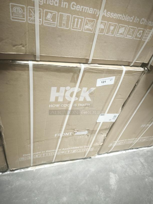 Brand new HCK D150-D fridge in packaging, 5.12 cu.ft, dual zone. Box marked "Designed in Germany, Assembled in China."