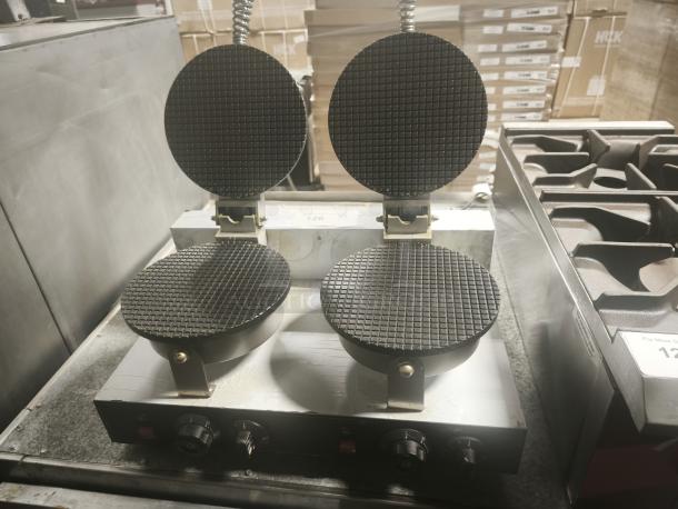 BRAND NEW SUNBOS JPX-DXG-2 ice cream cone baking machine with dual plates, spring hinges, and control knobs. Ideal for commercial use.