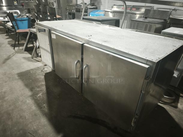 Brand new Victory URS‑2S2 commercial refrigerator sandwich & salad prep table, stainless steel, dual doors, industrial setting.
